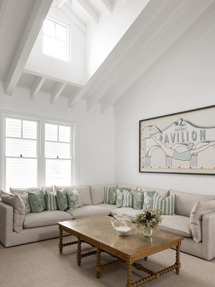 Modern living room featuring large custom windows Sydney with abundant natural light